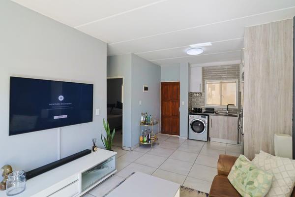 Fully tiled home, open plan lounge
Modern kitchen with stove and oven space including space for washing machine 
2 Bedroom fully ...