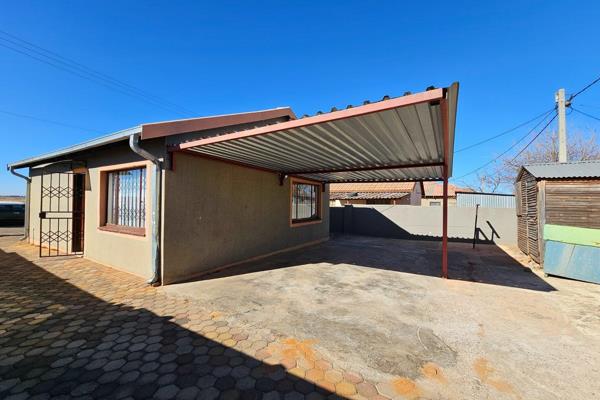 This neat property has the following on offer:

- Two bedrooms with built-in ...