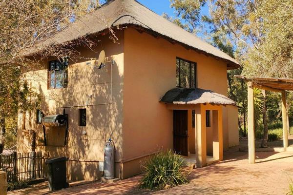 Nestled in the heart of a secure game lodge on Indaba Lane, this charming 2-bedroom ...