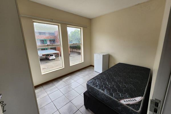 Features

- Private Room (Bed and Bar Fridge included)
- Small Living Area 
- ...