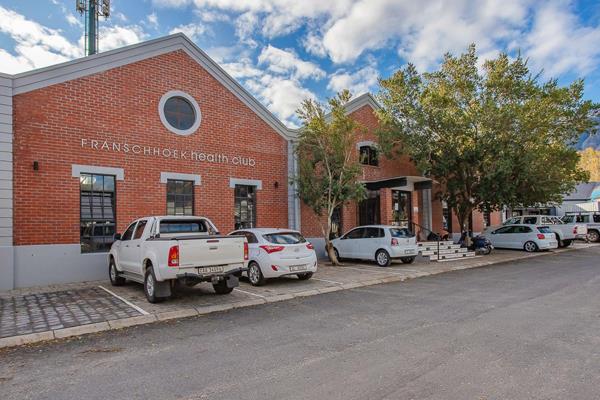 Lucrative Franschhoek business opportunity. This striking double-storey red-brick building, with its character black-framed windows, is ...