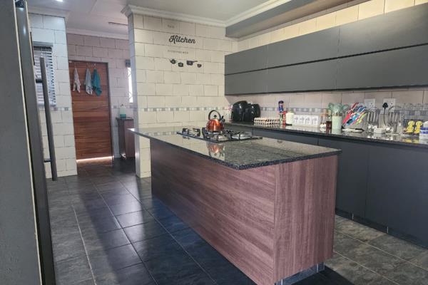 As you step into this beautiful property an open plan kitchen catches the eye first. ...