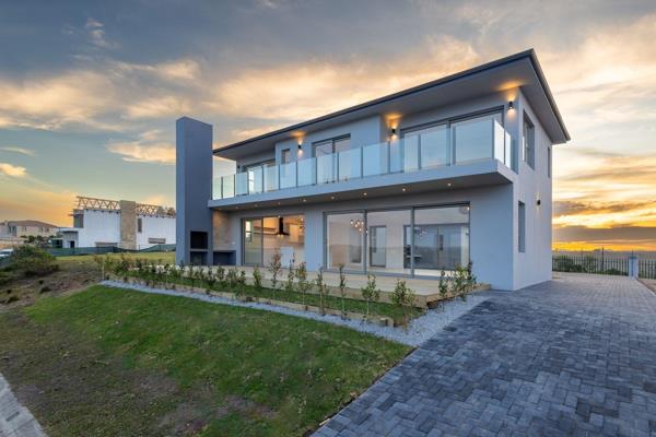 Welcome to your dream home in Plettenberg Bay, where every corner of this exquisite property offers unparalleled views of the ocean and ...