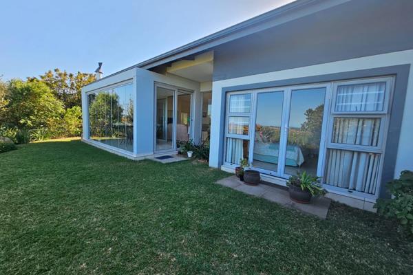 Step inside and be greeted by the enclosed veranda, featuring specialized lited doors ...