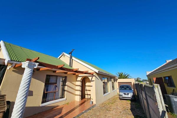 This delightful three-bedroom house features two bathrooms: an en-suite, a cosy TV room ...