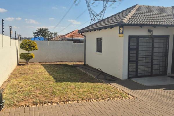 This is a 3 bedroom house with 2 bathroom with a spare room and covered packing, main ...