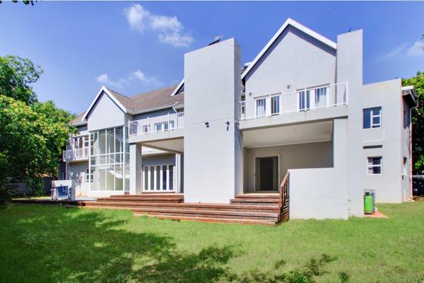 Walk through a double volume entrance with feature windows which ads light to the whole home.  The guest toilet is on the right as you ...