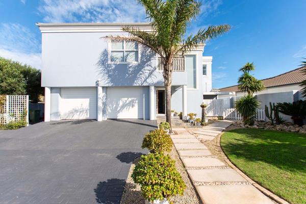 Discover this stunning large five-bedroom family mansion situated in the heart of Country Club, Langebaan, close to all essential ...