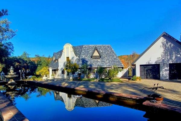 This exceptional gentleman&#39;s estate, steeped in history and nestled on a picturesque Klein Karoo farm, is now available on the ...