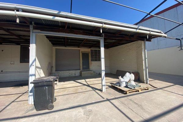 Neat Unit located inside an industrial park with a small loading bay and roller shutter ...