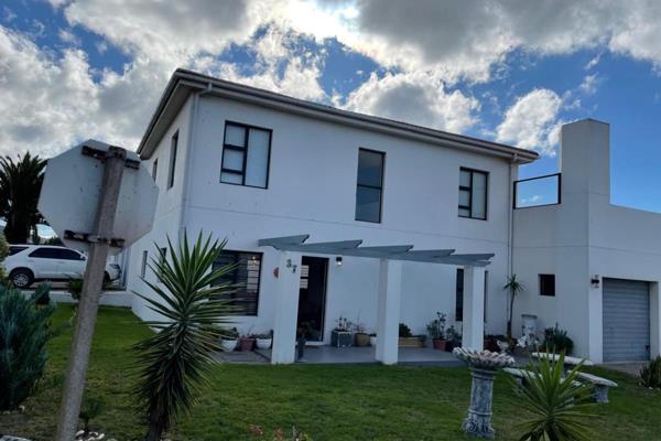 This spacious double storey house is situated second row from the sea, in the small ...