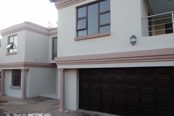 This double story house in situated in security complex in bendor .Modern and ...