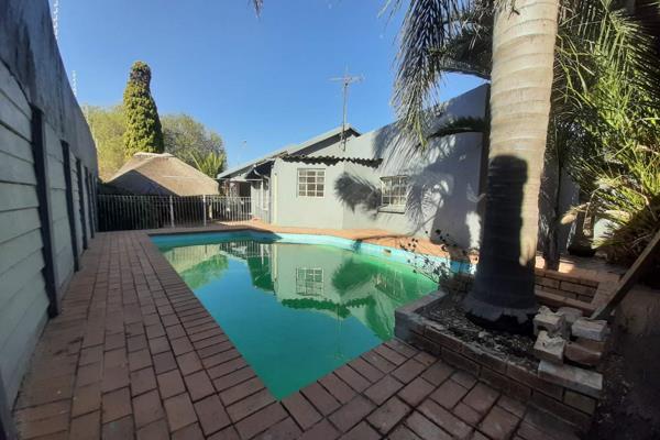 This is cute home is nestled in a well established quiet off the beaten track ...