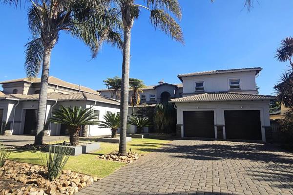 Magnificent 4 Bedroom family home with a bachelor flat, in the old part of Midstream Estate - with its established gardens and tall ...