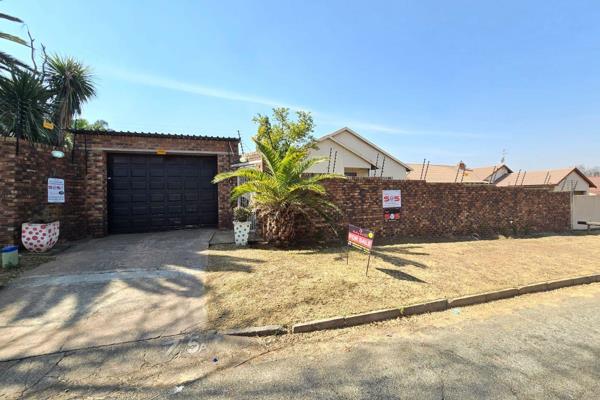 Inviting passage leading to a lounge and dining room area. Spacious kitchen with build ...