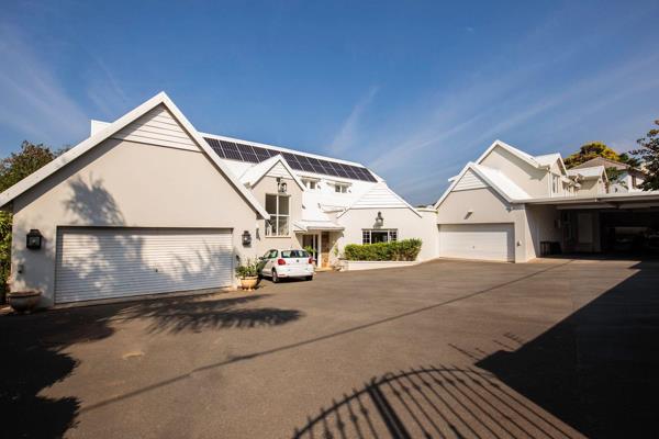 This captivating home offers an expansive piece of land in the sought-after road of Monteith Place. Find peace and relaxation in this ...