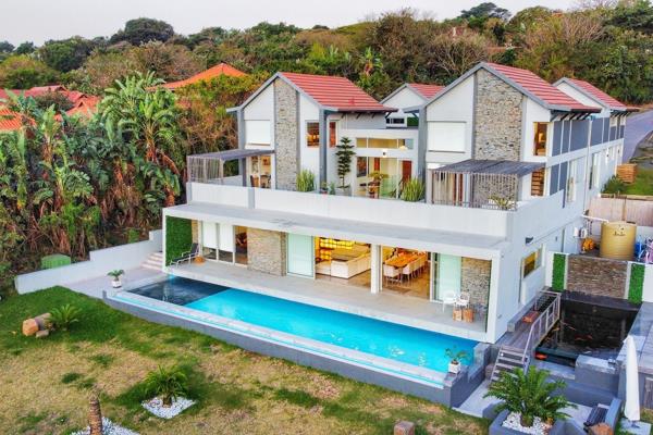 Exquisite Six-Bedroom Villa in Zimbali Estate

Architectural Masterpiece Inspired by Japanese Design
Discover unparalleled luxury in ...