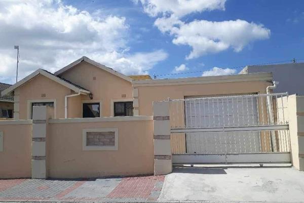 2 bedroom house in LItha Park, Khayelitsha with a kitchen, lounge, garage, bathroom and 4 incomplete outside flats with approved ...