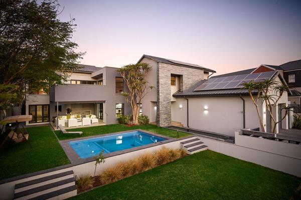 Modern and smart, this slick home perfectly balances the living areas with bedrooms and ...