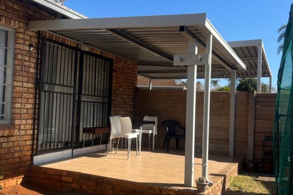 Townhouse Low maintained
Lounge dining room and kitchen with beautiful white ...