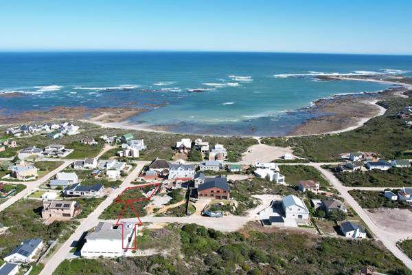 Exclusive Mandate : Escape to the serene coastal village of Suiderstrand and seize the opportunity to own a piece of this idyllic ...