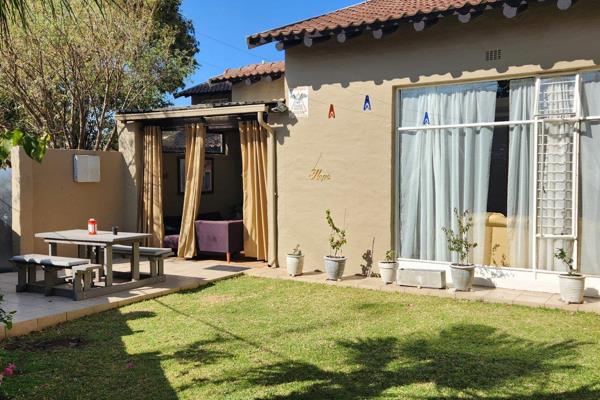 Duplex townhouse in a secure complex in Weltevreden Park. Sizable lounge with double ...