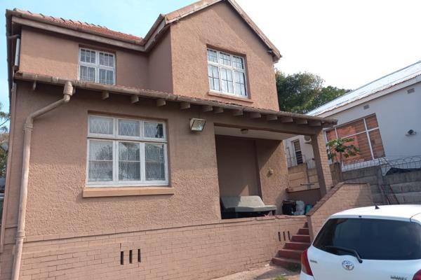 Ideal starter home for the extended family / fix me upper.   
3 bedrooms 1 bathroom, lounge and diningroom with wooden floors ...