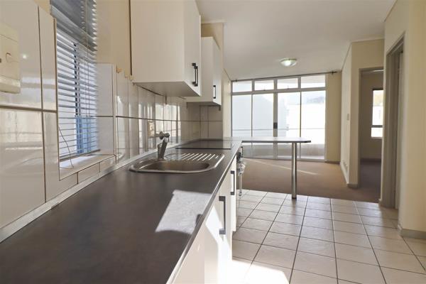 Sole Mandate. Brand new kitchen just installed! This gorgeous two-bedroom apartment has an open-plan renovated kitchen and lounge with ...