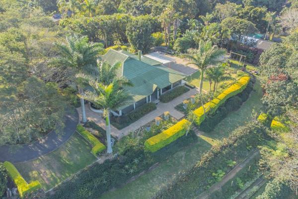 Sitting proudly and elevated with enchanting ocean views is this trendy, farm-style home ...