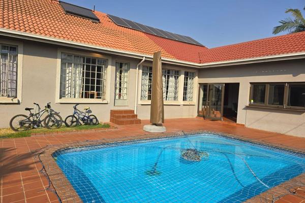 4 bedrooms
3 bathrooms
2 living areas
braai room with built in braai
swimming pool
very modern kitchen
double garage