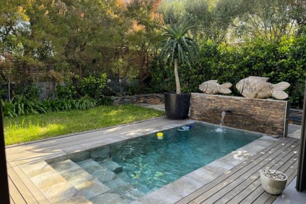 Discover unparalleled luxury in the prestigious gated Estate in Fernkloof. This ...