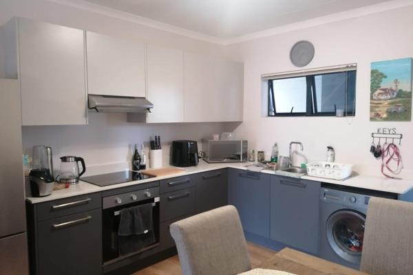 With 2 bedrooms featuring built-in cupboards and a modern bathroom, this apartment offers a comfortable and contemporary living ...