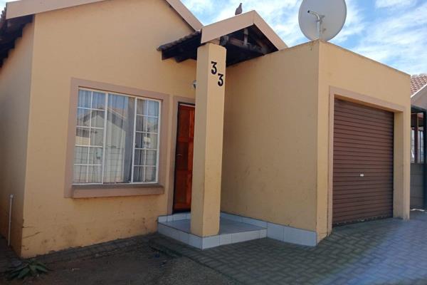 Townhouse is situated in a secure complex in Mohlakeng &amp; close to most major amenities.

The Townhouse offering:
-Open-plan ...