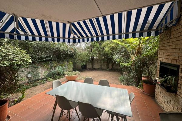 Enter this delightful townhouse to a spacious, tiled courtyard to welcome you into a ...