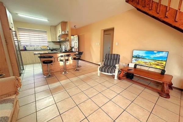 This three bedroom unit in a security estate with 24 hour security on site. The complex ...