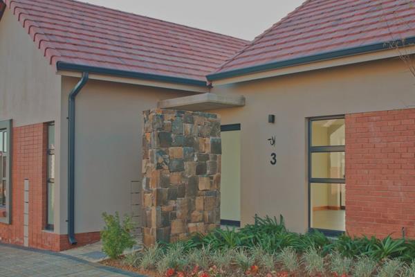 A beautiful north facing townhouse, bordering the green area in Wild Olive Estate&#39;s ...