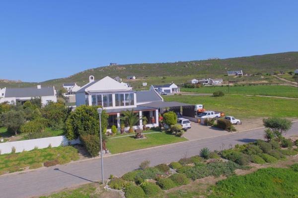 SANDPIPER VILLAGE  -  ST HELENA BAY

We introduce you to this SPACIOUS Double storey Home it is situated on a 640 square meter stand ...