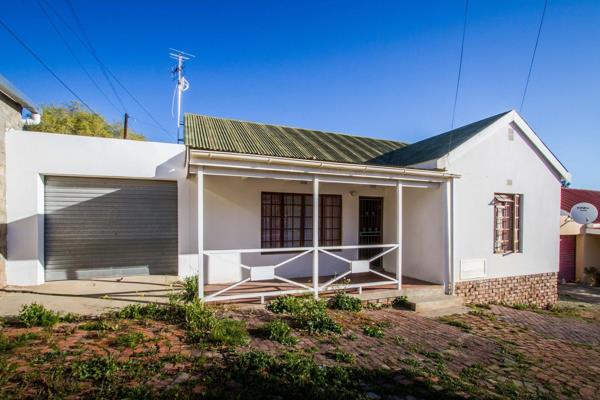 Welcome to this charming two-bedroom home in a cozy complex of just six properties. 

The heart of the home is the open-plan kitchen ...