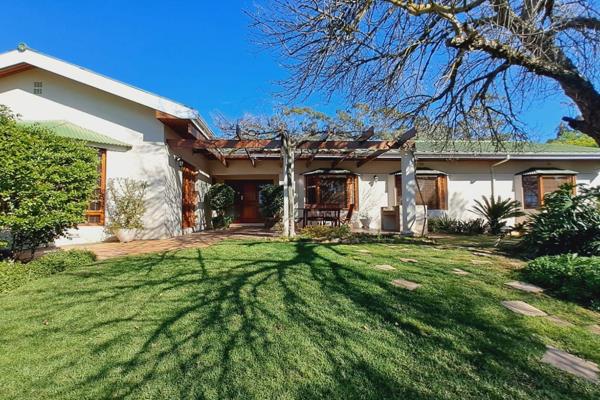 Experience the perfect blend of modern architecture and vintage charm in this ...