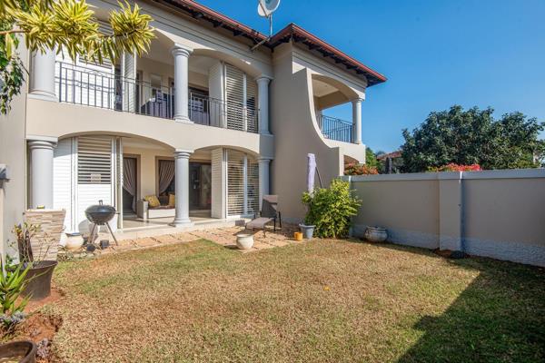 DUAL MANDATE: This elegant villa styled duplex with a fully fenced garden, easy access ...