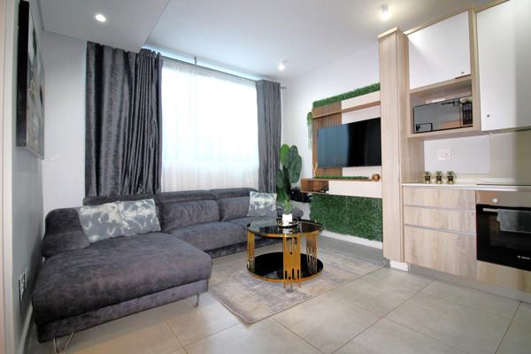 This modern, apartment features two air-conditioned bedrooms with a modern shared ...