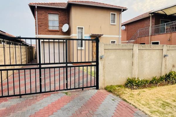 This warm lovely home offers the following:

This double storey house has an open plan kitchen and lounge tiled throughout. 4 spacious ...