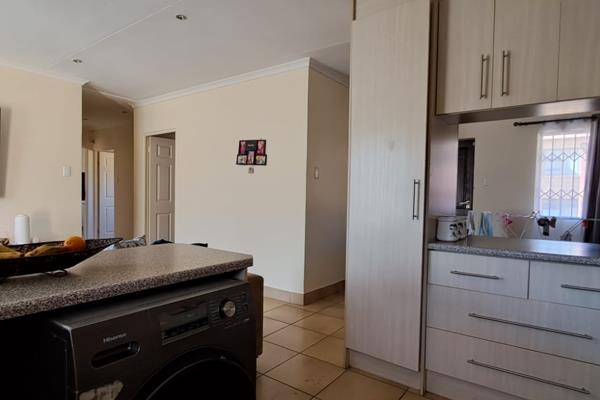 This property offers a modern open plan living and kitchen area with ample cupboard space. 

All 3 bedrooms are tiled and have ...