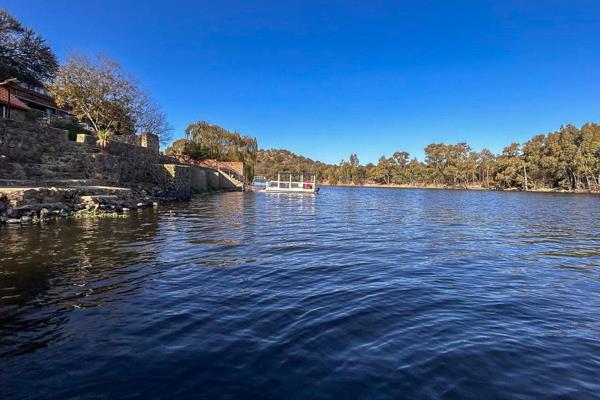 Experience unparalleled tranquility next to the Vaal River,  where this exceptional property offers an ambiance reminiscent of a ...