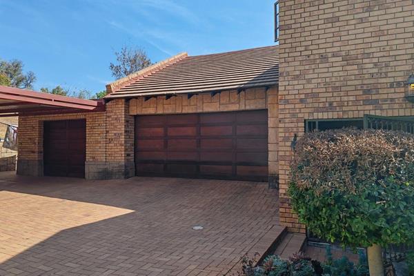 Nestled in a quiet cul-de-sac, this magnificent double-story face brick home epitomizes low-maintenance luxury. A true ...