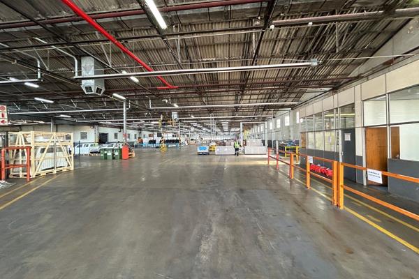 This industrial property presents an exceptional leasing opportunity with a spacious ...