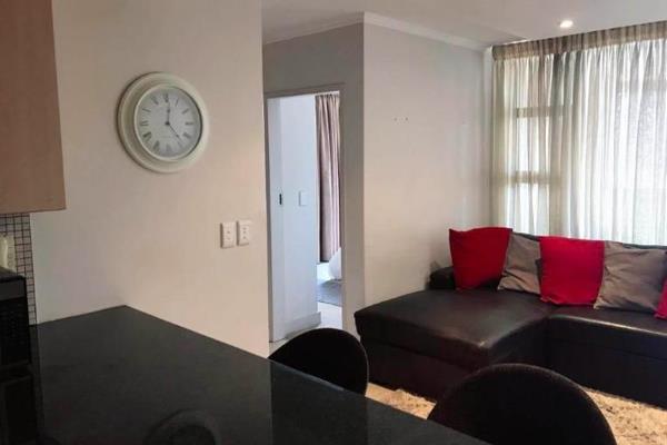 Less than 5 minute walk to the Gautrain and Sandton City, very easy access to the highway

Balcony closed off and great place to have a ...