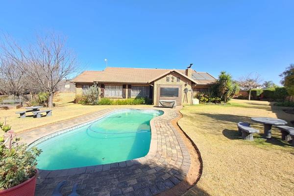 Welcome to this beautiful farmhouse-style home, where old-world charm meets modern comfort. This inviting residence offers a spacious ...