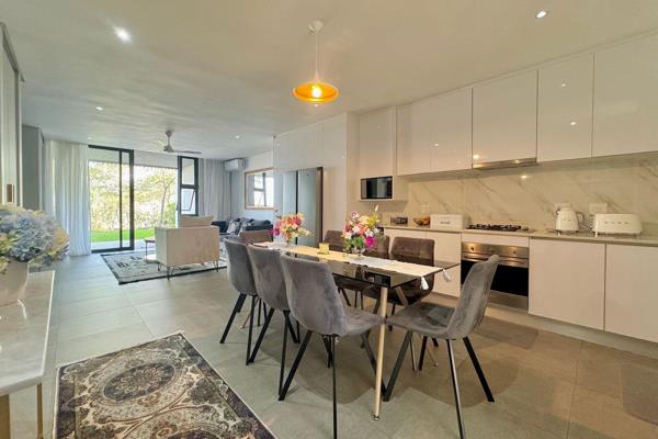 This ground floor luxe residence has a sophisticated and serene aesthetic with a design ...