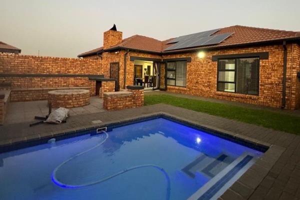 Off the grid and simply stunning, this beautiful home is equipped with an automated inverter and solar panels for seamless ...